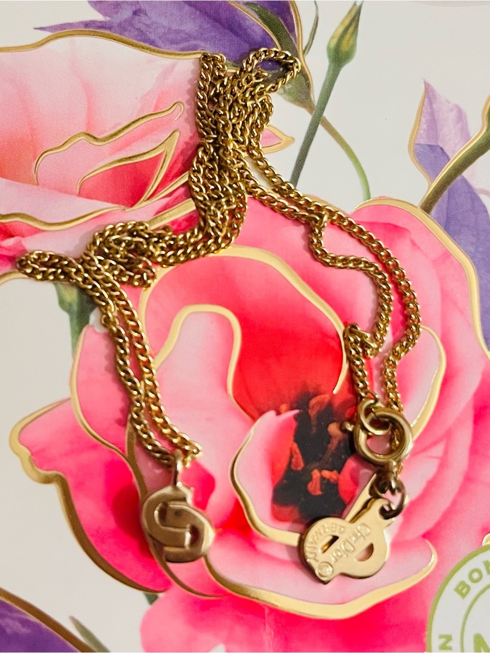 Like New Dior intricately designed gold necklace with renowned logo CD pendants